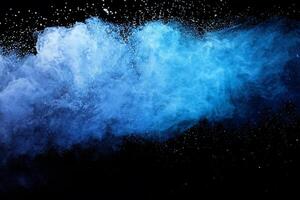 Blue Dust Splash, Closeup on Isolated Black Background photo