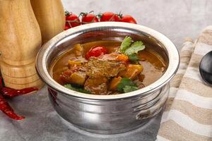 Yellow Thai curry with beef photo