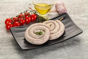 Natural spiral sausage for grill photo