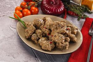 Beef liver with cream sauce photo