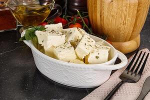 Greek traditional Feta cheese cubes photo