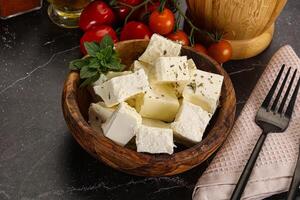 Greek traditional Feta cheese cubes photo