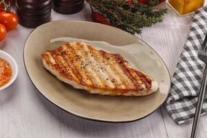 Grilled turkey fillet steak with sauce photo