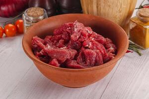 Raw beef meat - sliced strips photo