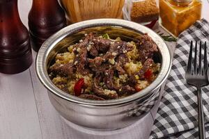 Traditional couscous with beef and vegetables photo