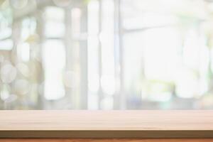 Empty Wooden Table as Focal Point in Blurred Living Room Interior. photo