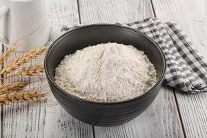 Wheat flour heap for bake photo