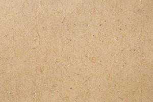 Eco Friendly Kraft Paper Texture on Cardboard Background. photo