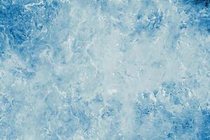 Textured Blue Ice Background with Frozen Intricacies photo