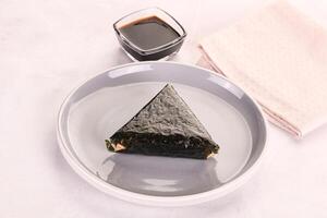 Japanese traditional onigiri with fish photo