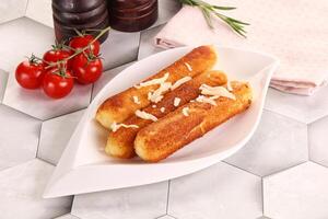 Fried cheese sticks for snack photo