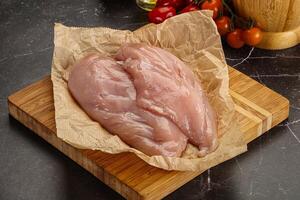 Raw chicken breast fillet for cooking photo