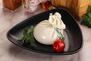 Italian dairy soft cheese - Burrata photo