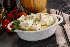 Greek traditional Feta cheese cubes photo