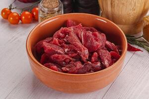 Raw beef meat - sliced strips photo