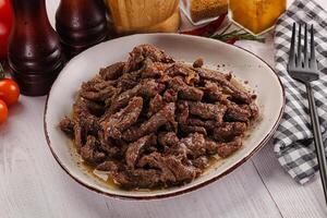 Stew beef slices with gravy photo