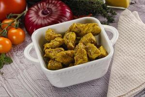 Indian cuisine curry chicken fillet photo