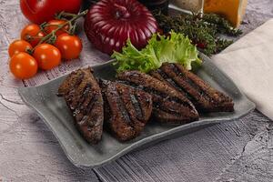 Grilled diet beef liver steak photo