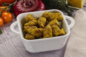 Indian cuisine curry chicken fillet photo