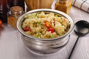 Vegan cuisine couscous with vegetables photo