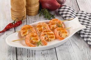 Grilled king prawn skewer snack photo