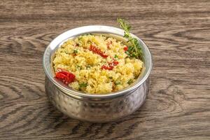 Vegetarian uisine - couscous with vegetables photo