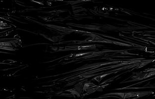 Plastic Wrap Texture Overlay on Dark Background, Artistic Wrinkled Pattern for Design Enhancement. photo