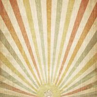 Vintage backdrop with vibrant sunrise, sunburst, and textured retro paper. photo