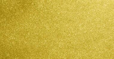 Glimmering Gold, Abstract Bokeh Lights with Sparkling Glitter. photo