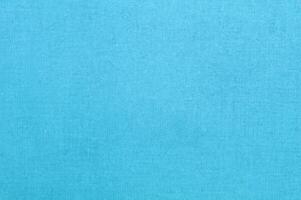 tranquilo ligero azul algodón tela textura, de la naturaleza textil armonía. foto