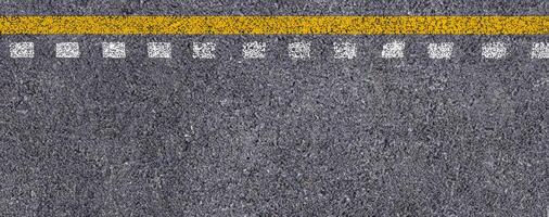 Top View of Double Yellow and White Lines on Asphalt Road Texture Background. photo