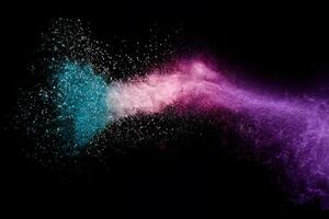 Vibrant Holi Powder Burst in Frozen Motion on Black Background. photo