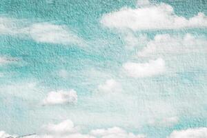 Abstract Double Exposure, Clouds and Sky on Paper Texture Background photo