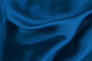 Sumptuous Indigo Fabric, Luxurious Texture for Creative Backgrounds and Artwork, Evoking Silk or Linen Elegance. photo