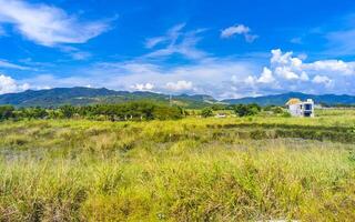 Drive past the tropical jungle mountains and countryside Mazunte Mexico. photo