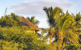 Mountain panorama cliffs rocks hilly tropical landscape building house Mexico. photo