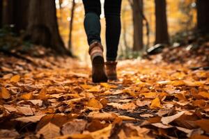ai generado un cerca arriba de un de la persona pies caminando a lo largo un bosque camino alfombrado con caído hojas, inmersión en el sensorial delicias de otoño. generativo ai foto