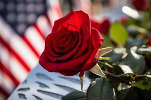 AI generated A lone rose placed on the names of victims at a Patriot Day memorial. Generative AI photo