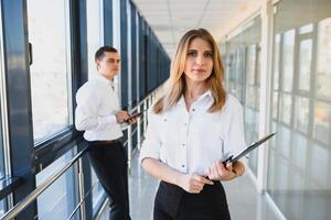 Modern business woman in the office with copy space photo