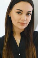 Portrait of a smilling brunette woman photo