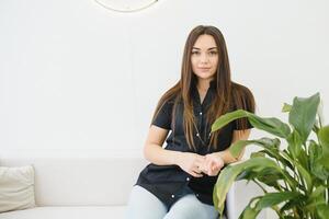 Portrait of a smilling brunette woman photo