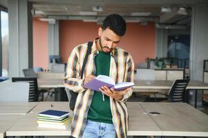 indian student with books at university photo