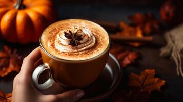 ai generado un de la persona manos aspersión canela en un calabaza especia latté. generativo ai foto