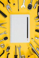 Set of various construction tools. Tools for home repair. Work at a construction site. On a yellow background. Flatly. Flatlay photo