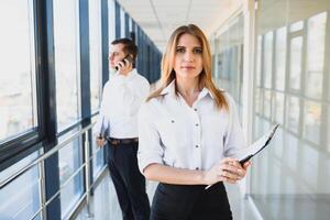 Modern business woman in the office with copy space photo