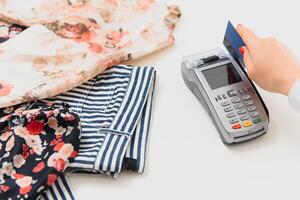 paying through smartphone using NFC technology. payment by phone through the terminal photo