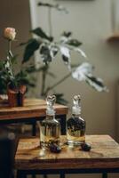 Delicate bottles of massage oil adorn the massage room, adding a touch of elegance to the decor while promising relaxation and rejuvenation. photo