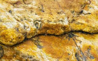 patrón de textura de pared de piedra y ladrillo en bruto puerto escondido méxico. foto