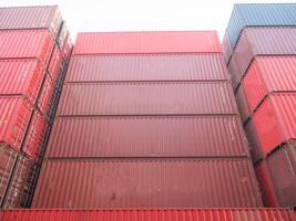 Container metal steel pier vessel wharf storage port work import export logistic custom commercial trade cargo manufacturing heavy good crane loading business economy operation dubai international photo