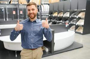 Man choosing a batgh sink photo